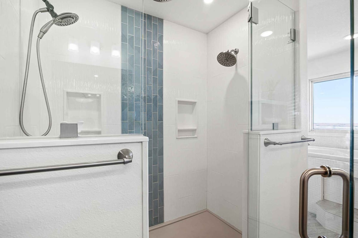 large open shower remodel with 2 shower heads