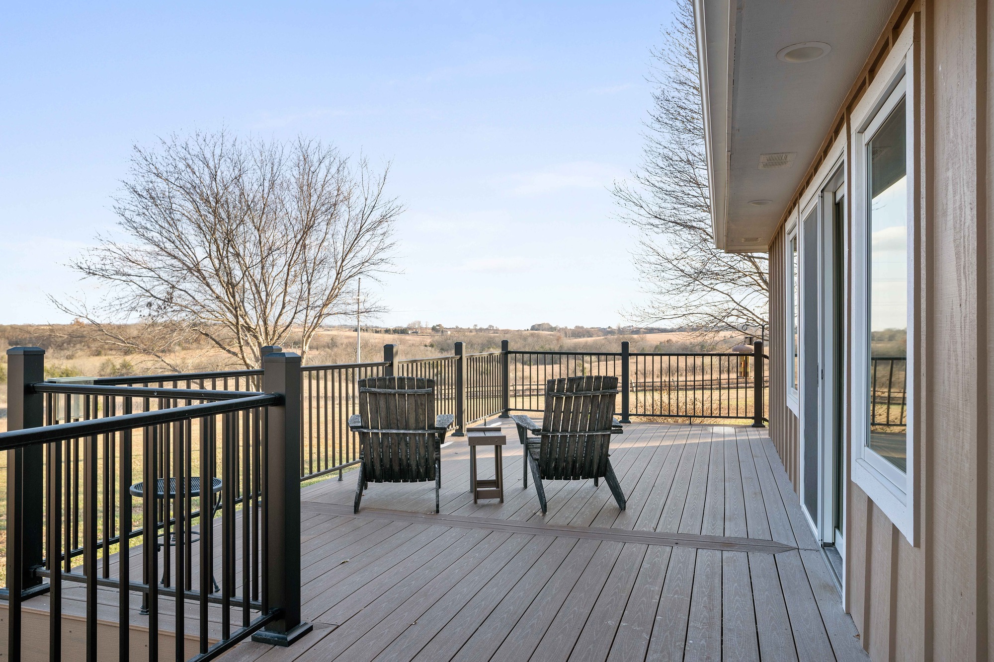 deck remodel in manhattan kansas with black railing